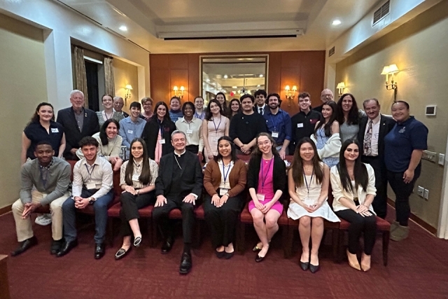 SDVP poses for a photo with Bishop Brennan