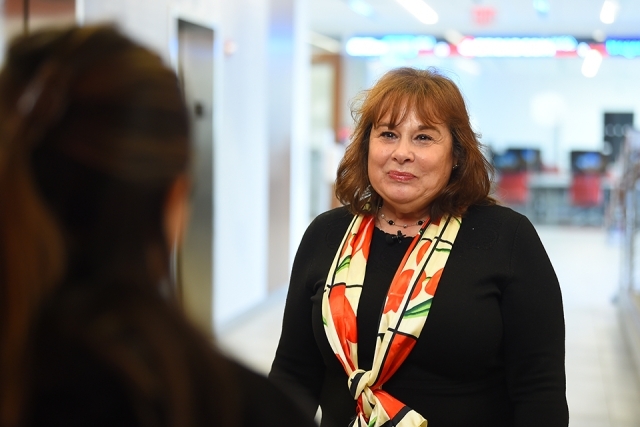 inset of female Tax Volunteer in 2023