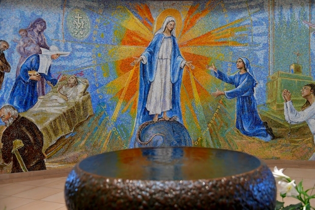 Baptismal fountain in St. Thomas More Church lobby