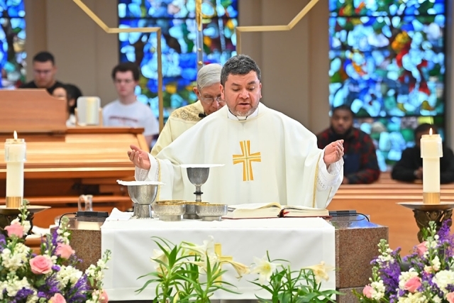 Priest reading or speaking during mass