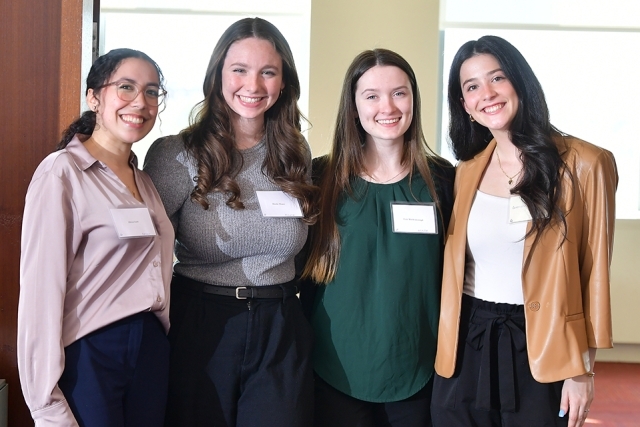 Four female School of Ed students pose for a photo