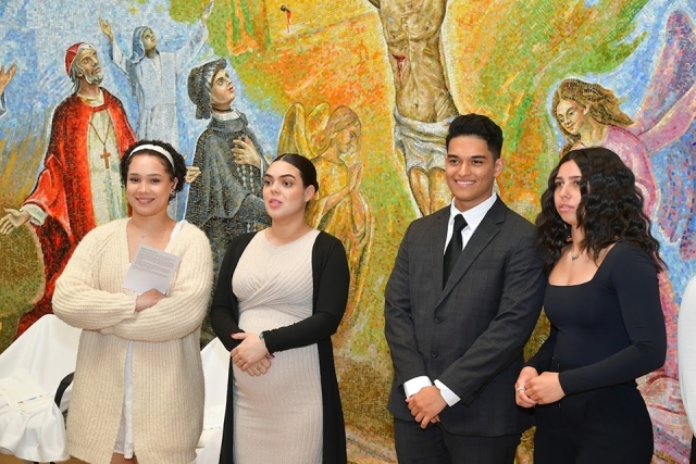 Four RCIA members pose for a photo