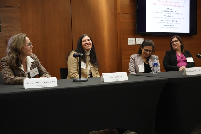 Four women sitting on the Women's Alumni Panel