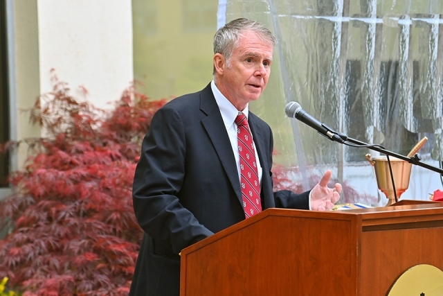 Man speaking at podium