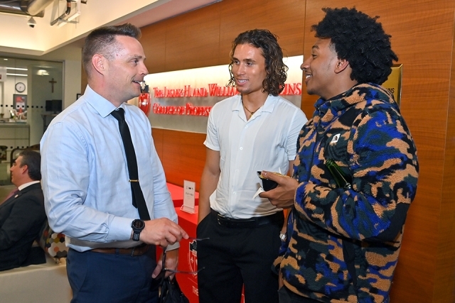 St. John's community members interacting at event