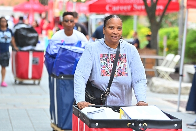 St. John's family members rolling carts