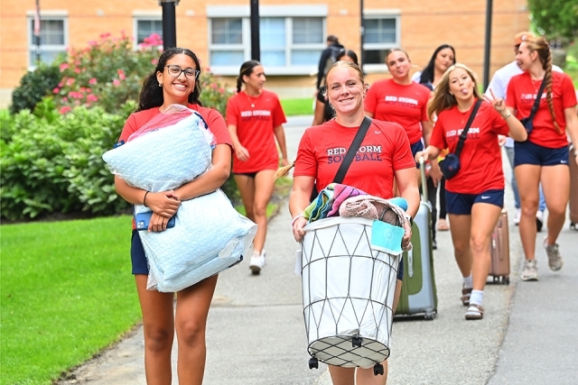 St. John's Softball team helps with move-in
