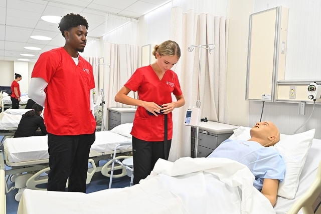 St. John's Nursing Students working in lab