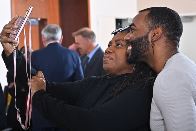 Two MLK Dinner attendees taking a selfie
