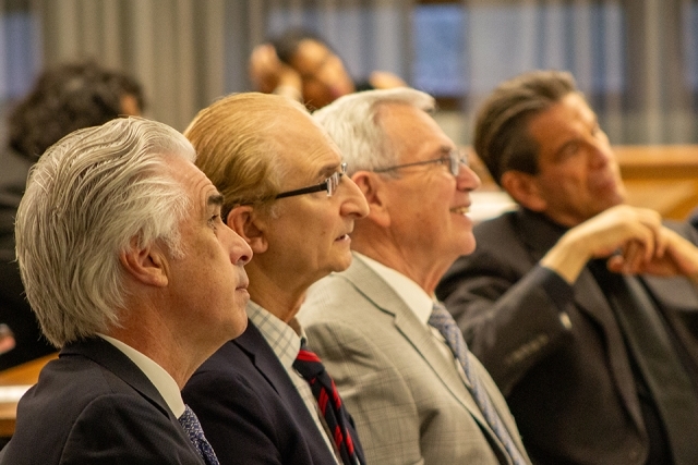 Four males sitting at James and Eileen Christmas Business Plan Competition