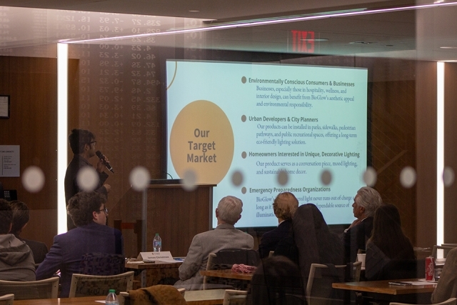 Student presenting at James and Eileen Christmas Business Plan Competition