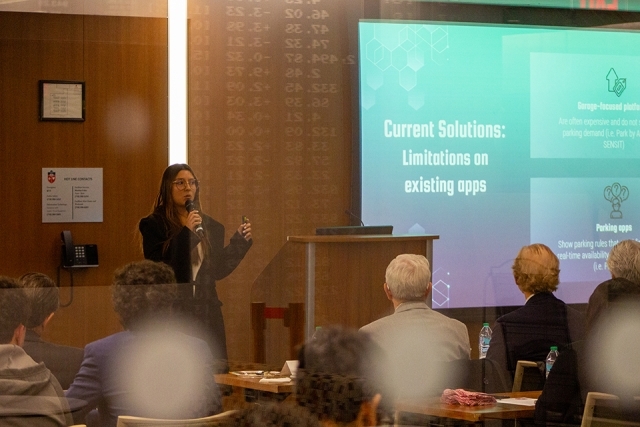 Student presenting at James and Eileen Christmas Business Plan Competition