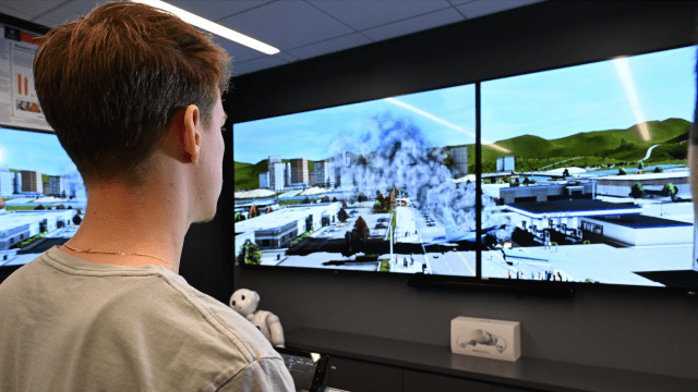 Student working on computer in Homeland Security Lab