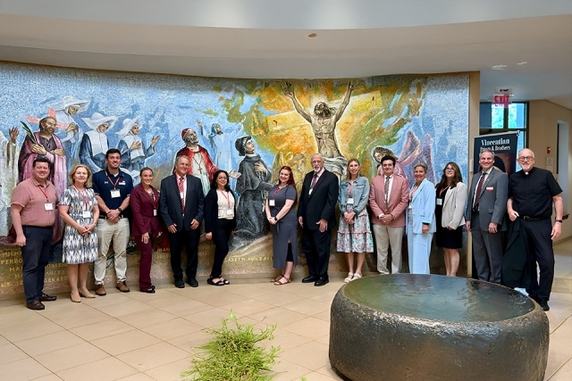 CSTS members in St. Thomas More Church lobby