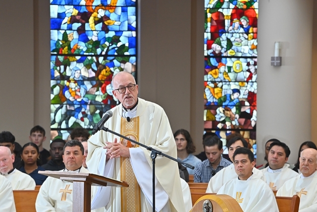 Fr. Rooney at mass. 