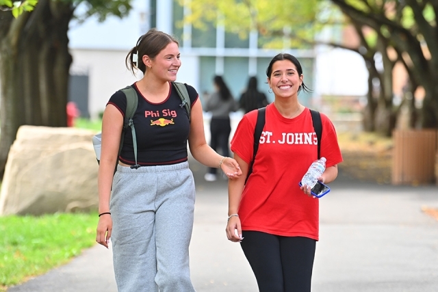 Two students walking on the SJU campus