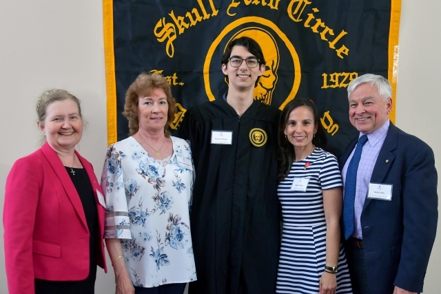 Christine M. Goodwin, '96C, '98G, '07PD, '21Ed.D. with others at the Skull and Circle ceremony