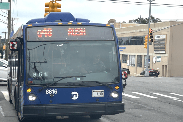 Q46 Bus Rush driving west