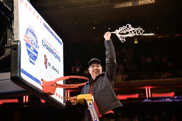 Rev. Richard Rock Cutting Down the net from the BIG EAST Championship game