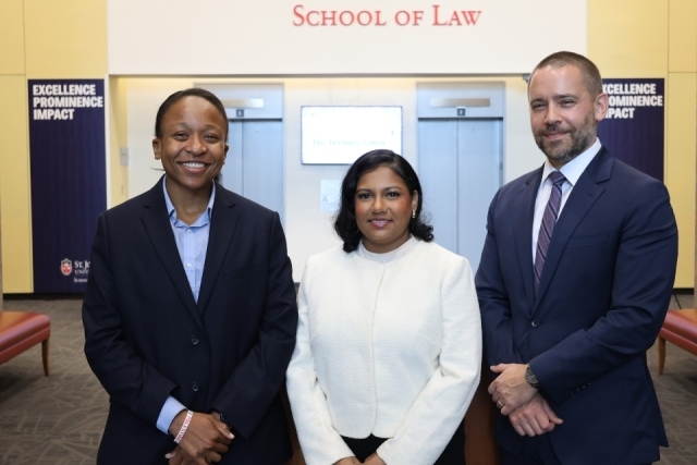 St. John's Law students Nathalie Amazan and Cassie Khan with Professor Marty LaFalce