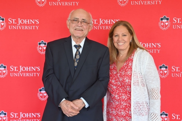 Man and woman smiling for picture