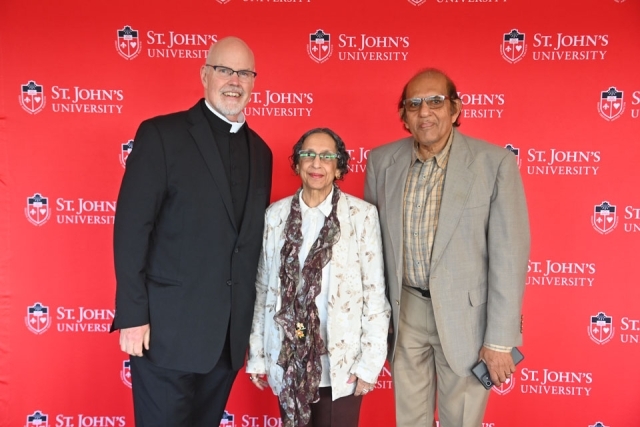 Three faculty members standing