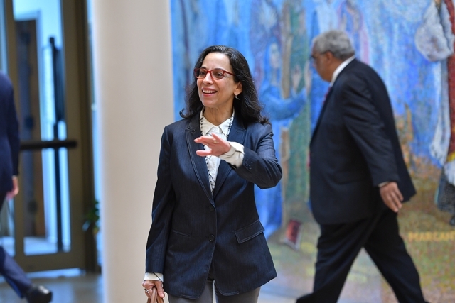 Dean Delgado walking in church lobby