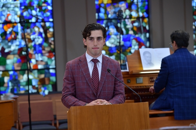 Man speaking at ambo