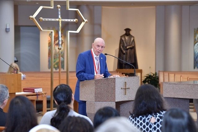 Honoree speaking at ambo