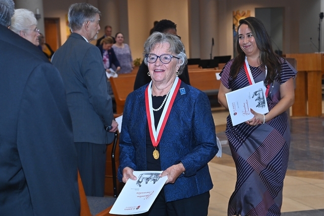 Honorees walking in church