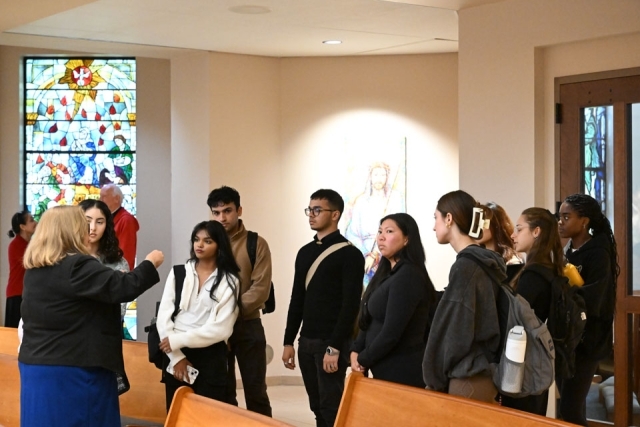 Students lining up in church