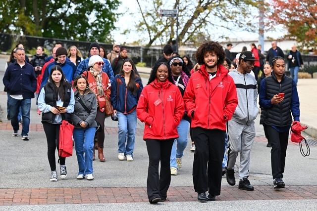 Prospective students and parents walking around campus
