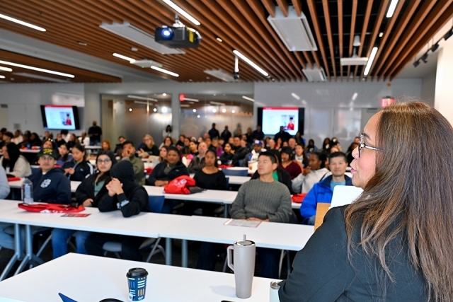 Prospective students and family members in session