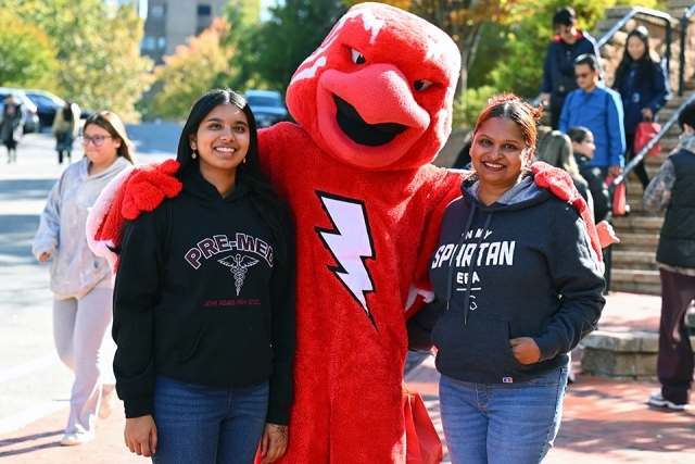 Johnny Thunderbird with female student and parent