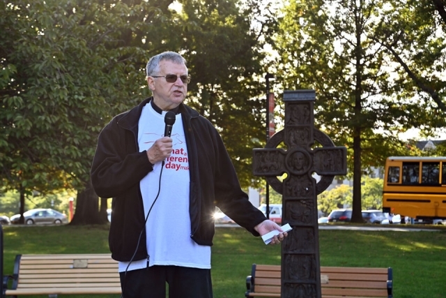 Fr. Griffin speaking outside at Service Day