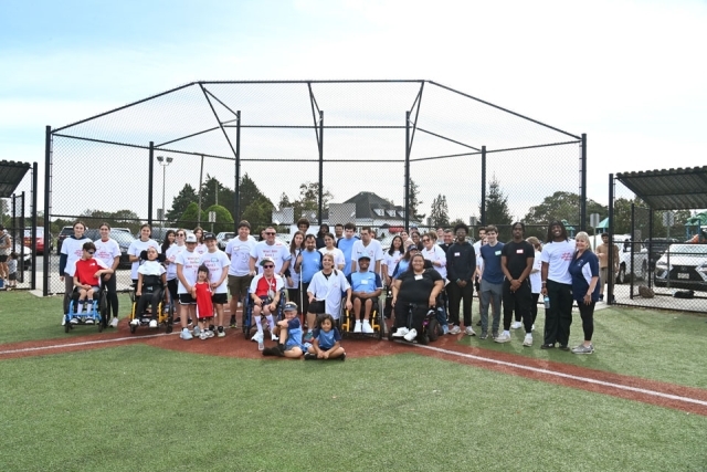 Service Day participants on baseball field