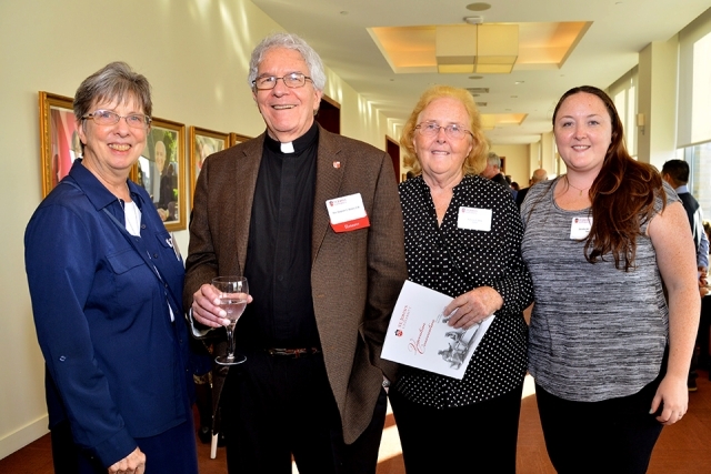 Rev. Stephen Bicsko, C.M. with group of people