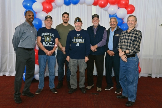 group of men taking a photo 