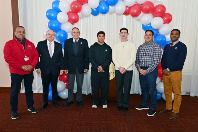group of men taking a photo 