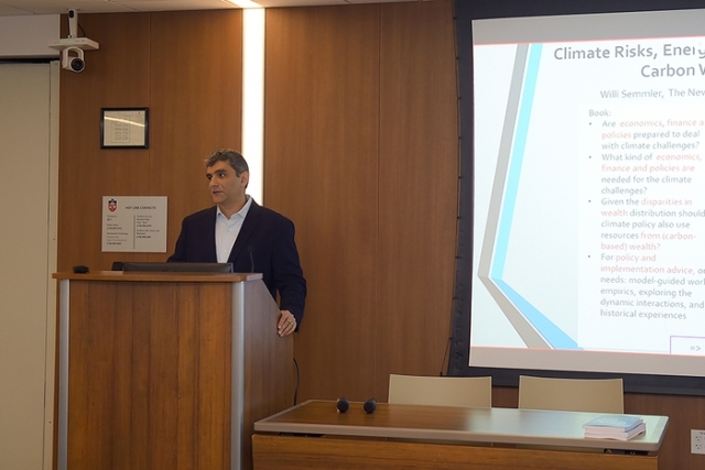 Male speaker at podium during a lecture hall