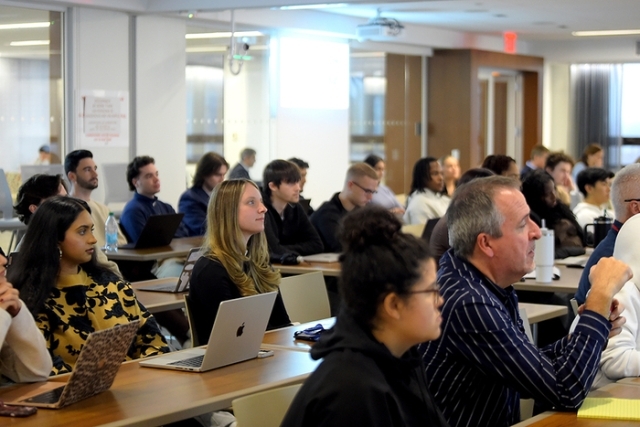 Students listening in lecture hall