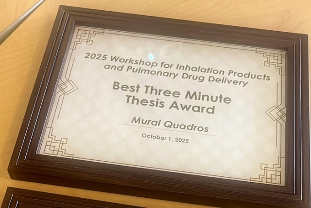 Award framed, stating "Best Three Minute Thesis" 