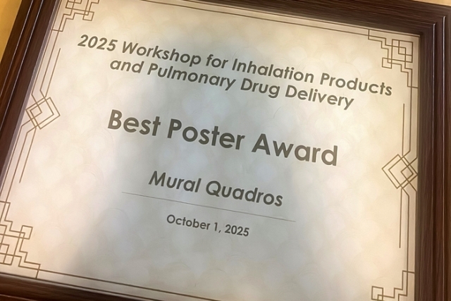 Award framed, stating "Best Poster" 
