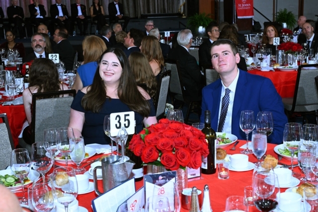 Attendees seated at Table 35