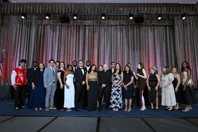 Attendees and honorees onstage