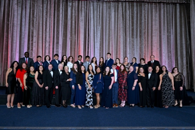 Attendees and honorees onstage