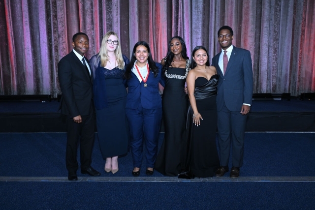 Attendees and honorees onstage