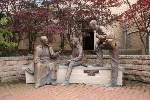 St. Vincent with two students