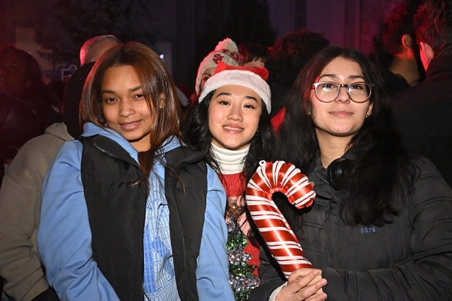 Three female students at the winter carnival