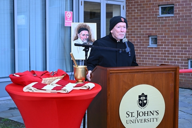 Fr. Shanley speaking at podium 
